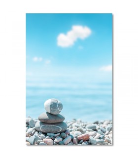 Cuadro piedras apiladas junto al mar en calma