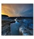 Cuadro de rocas marinas al atardecer